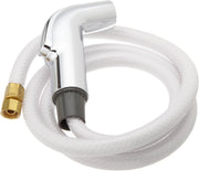 Chrome side spray with white flexible hose and brass connector attached.