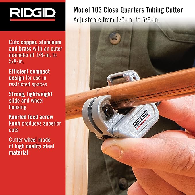 RIDGID Model 103 Close Quarters Tubing Cutter positioned on copper tubing, held in hand.