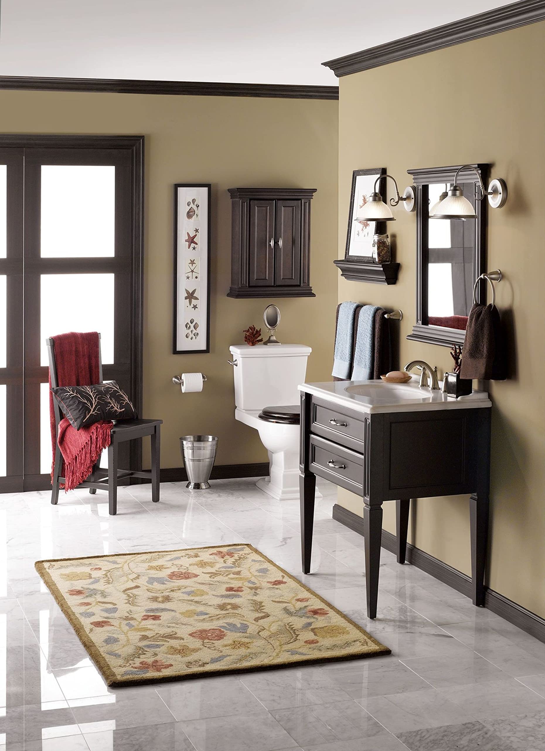 Chrome towel bar mounted on beige bathroom wall above sink vanity.