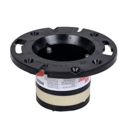 Black ABS closet flange with mounting holes, label, and central opening for toilet drain connection.