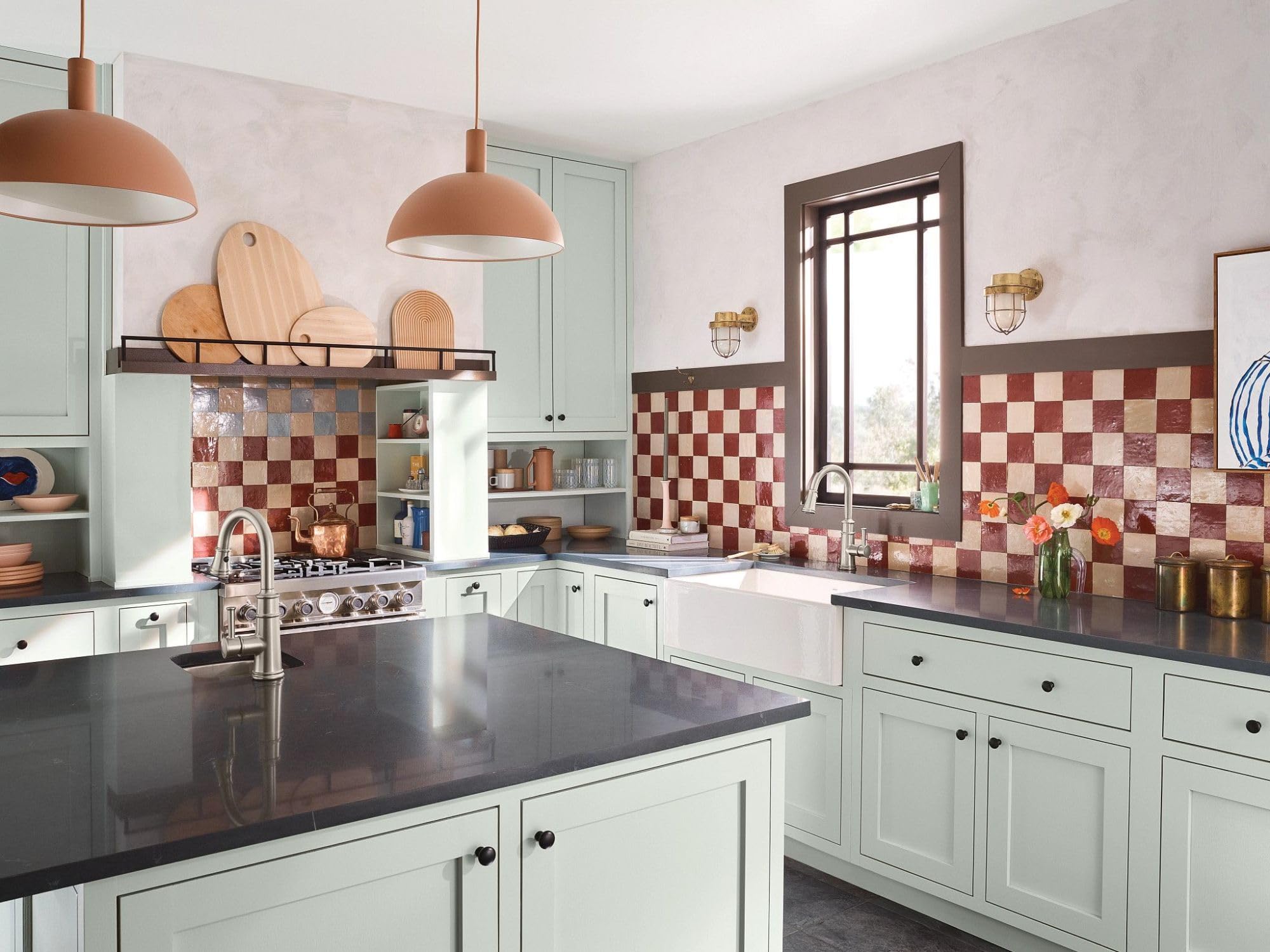 Stainless steel pulldown bar faucet with single handle mounted on kitchen island countertop in modern kitchen setting.
