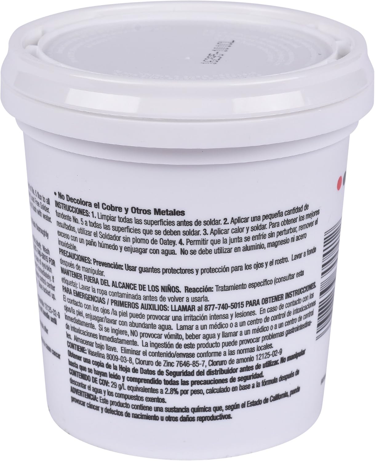 White plastic container with lid labeled "No Decolora el Cobre y Otros Metales" and safety instructions in Spanish.