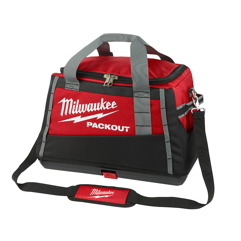 Red and black Milwaukee PACKOUT tool bag with gray handles and shoulder strap.