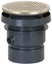 Nickel bronze floor drain with adjustable hub, dark gray body, and diamond-pattern steel cover.