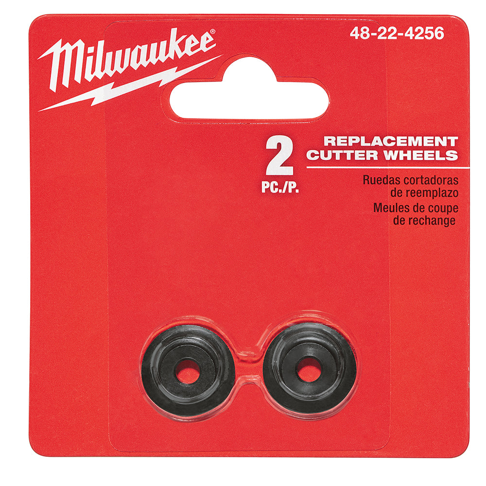 Two black circular cutter wheels with center holes mounted on red Milwaukee branded packaging.