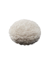 Round white wool cutting pad with dense pile texture and flat backing surface.