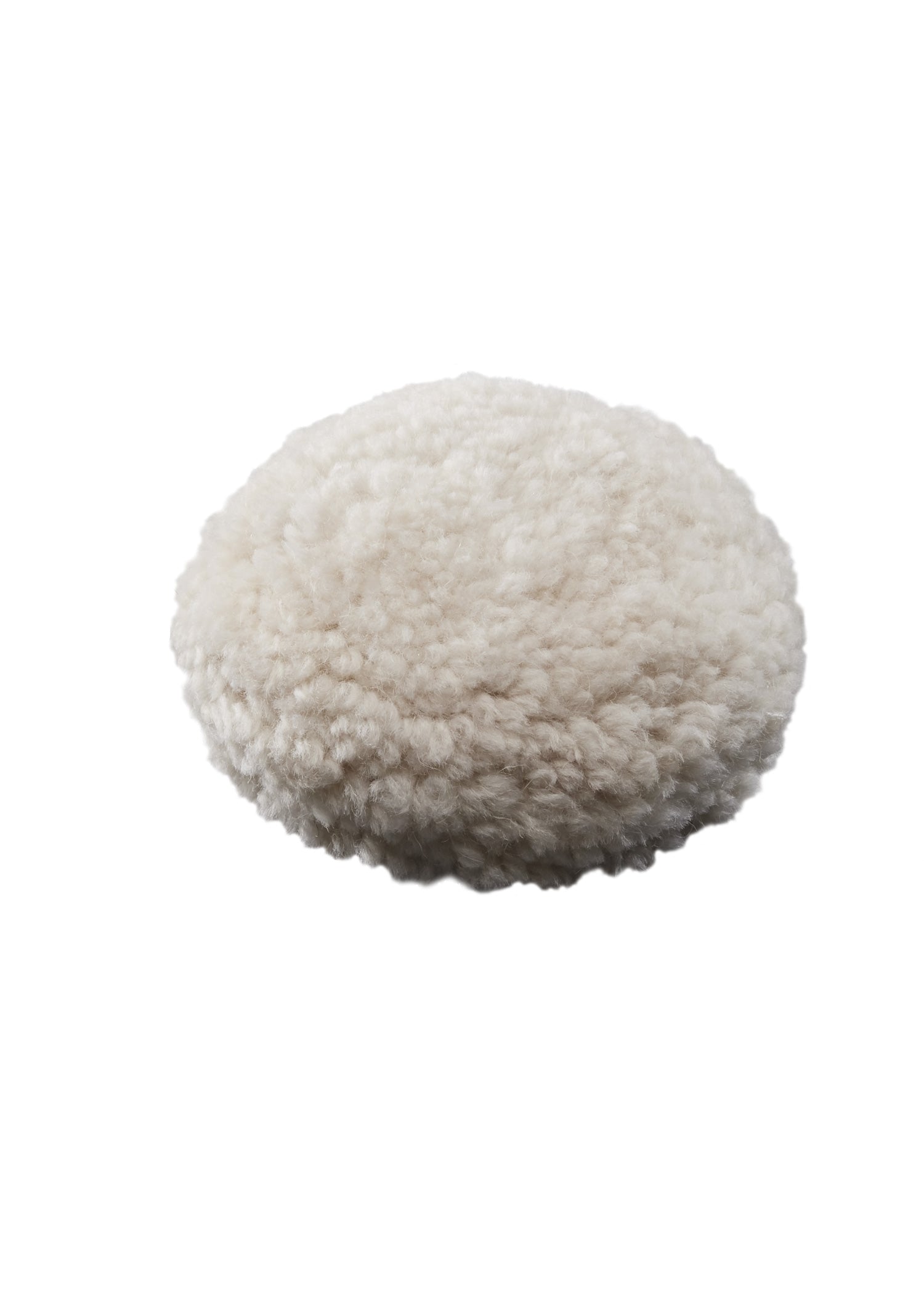 White wool cutting pad with fluffy texture, 3 inches in diameter.