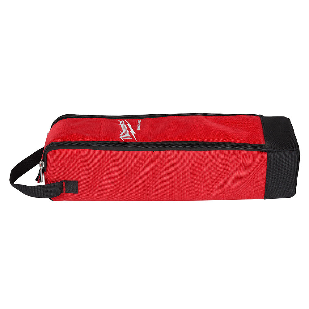 Red and black Milwaukee tool bag with zippered compartment and carrying strap.