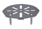 Stainless steel pipe strainer with circular perforated basket and two support legs.