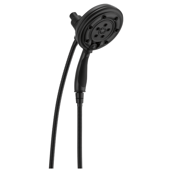 Black round shower head with multiple spray jets and attached flexible hose on white background.