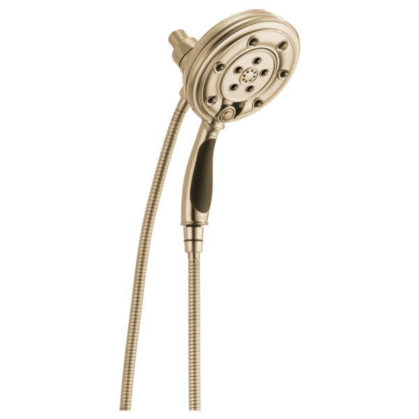 Brushed nickel round showerhead with handheld shower head connected by flexible hose.