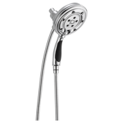 Chrome round shower head with multiple spray holes and black grip handle, connected to flexible hose.