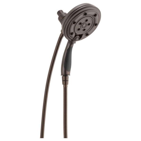 Round dark bronze showerhead with multiple spray nozzles attached to a flexible hose with grip handle.