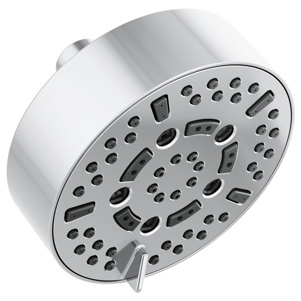 Round chrome shower head with multiple spray nozzles and control lever mounted on white cylindrical wall bracket.