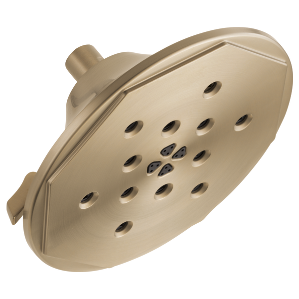 Round brushed nickel wall-mount shower head with multiple spray jets and brass arm connector.