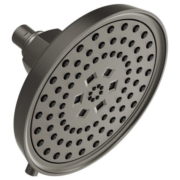 Round dark gray shower head with multiple circular spray holes and diamond-shaped jet openings on face, mounted on angled arm