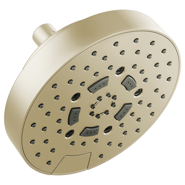 Champagne-colored round wall mount shower head with multiple spray jets and control settings.