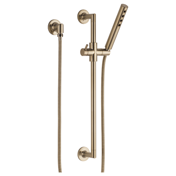 Brushed gold slide bar shower system with angled handshower head, vertical rail, and two flexible hoses with wall-mounted con