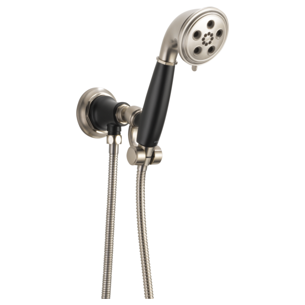 Brushed nickel wall mount handshower with black grip and multiple spray holes, connected by metal hose.