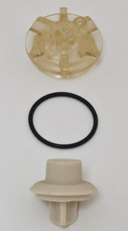 Vacuum breaker repair kit with tan plastic housing components and black rubber ring seal.