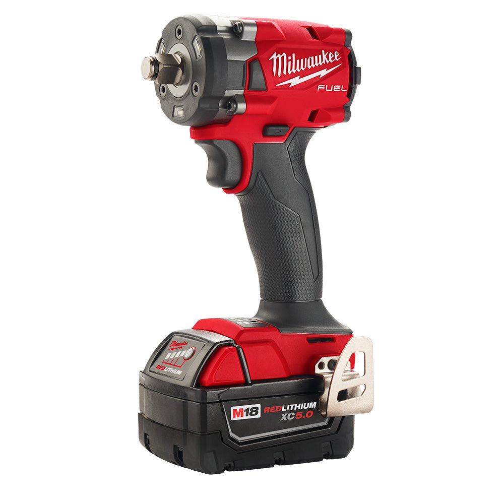 Milwaukee M18 FUEL compact impact wrench with friction ring, red and black body, with M18 RedLithium XC5.0 battery.