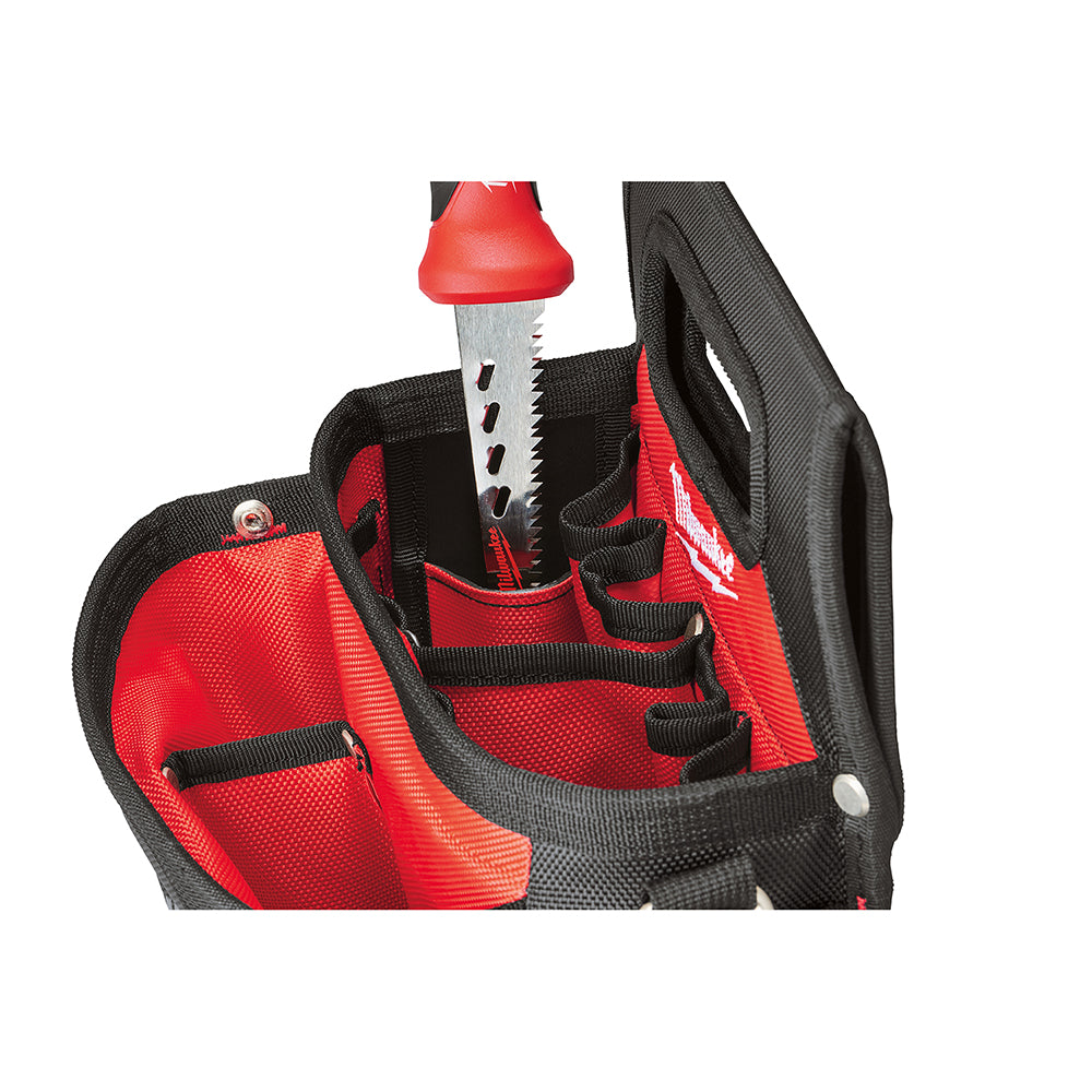 Red and black work pouch with multiple compartments, black webbing belt, and a red-handled saw tool displayed on top.