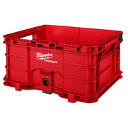 Red Milwaukee PACKOUT plastic crate with handles, compartments, and latch closure on front.
