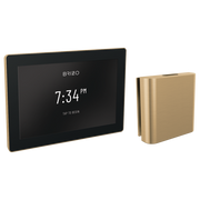 Digital steam shower control panel with touchscreen display and gold trim, paired with rectangular gold steam generator unit.