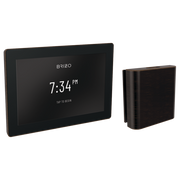 Brizo digital steam shower control with touchscreen display showing 7:34 PM and separate Venetian bronze remote control unit.