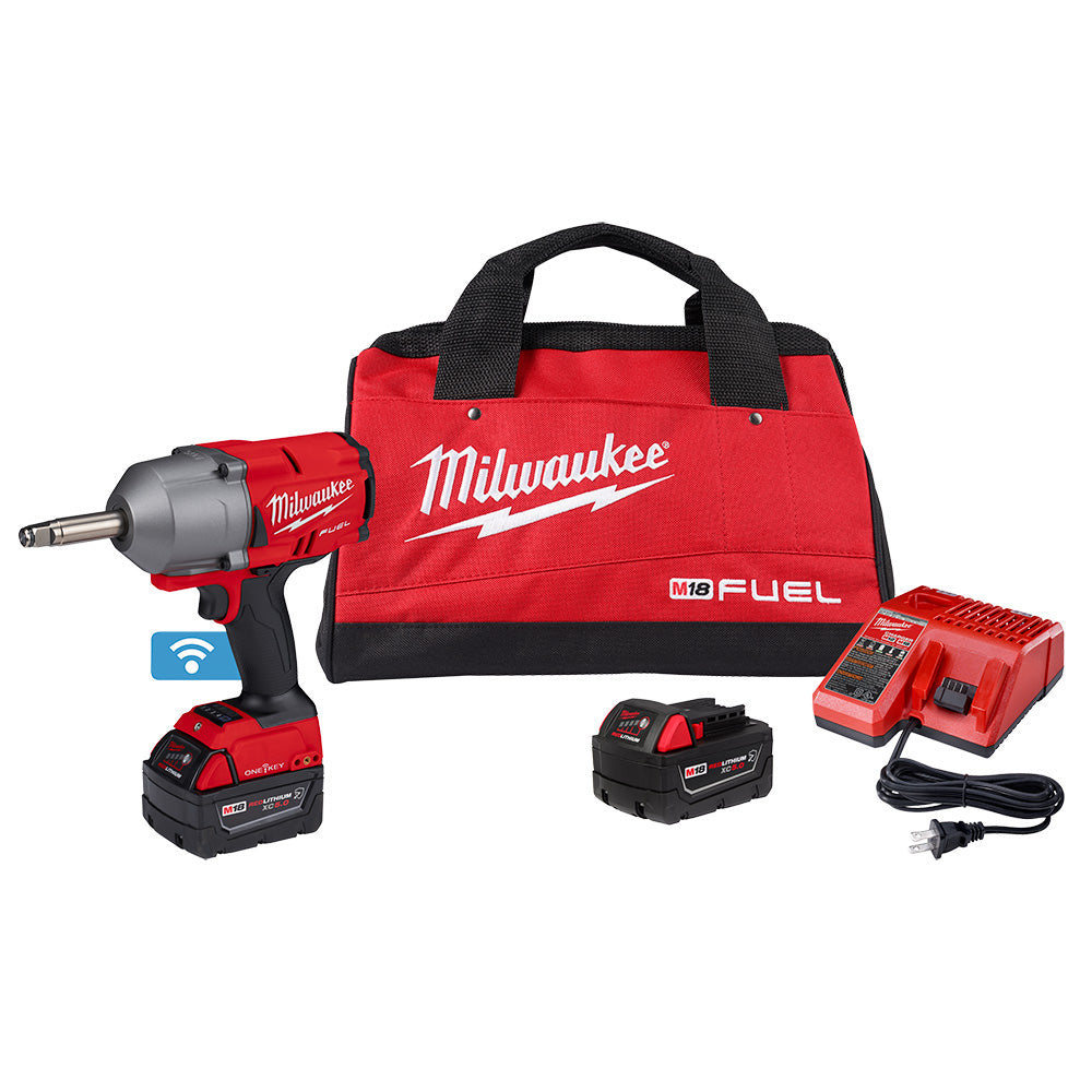 Milwaukee M18 FUEL impact wrench with extended anvil, two batteries, charger, and red canvas carrying bag.