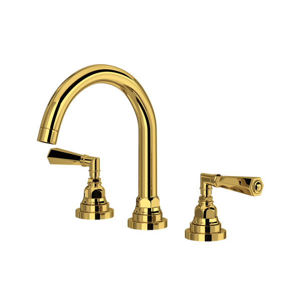 Unlacquered brass three-piece lavatory faucet with curved C-spout and lever handles.