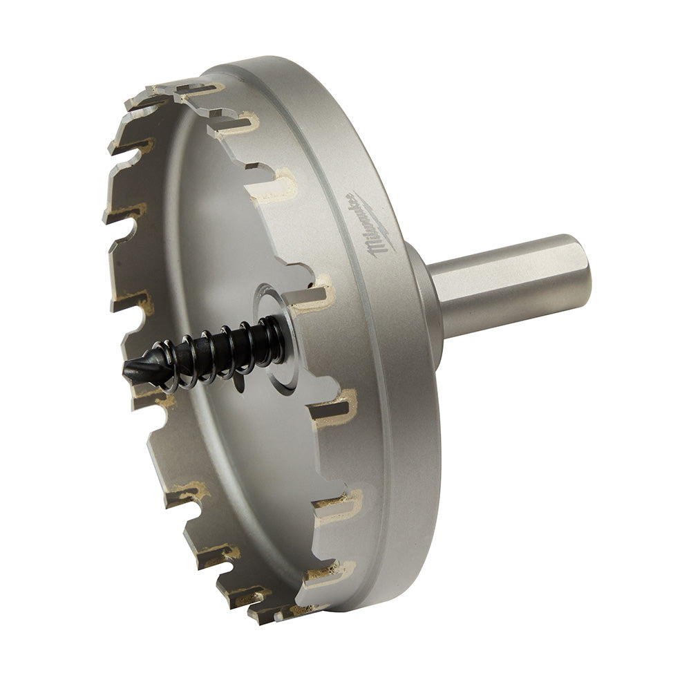 Silver carbide hole cutter with toothed cutting edge, cylindrical shaft, and black spring-loaded center bit.