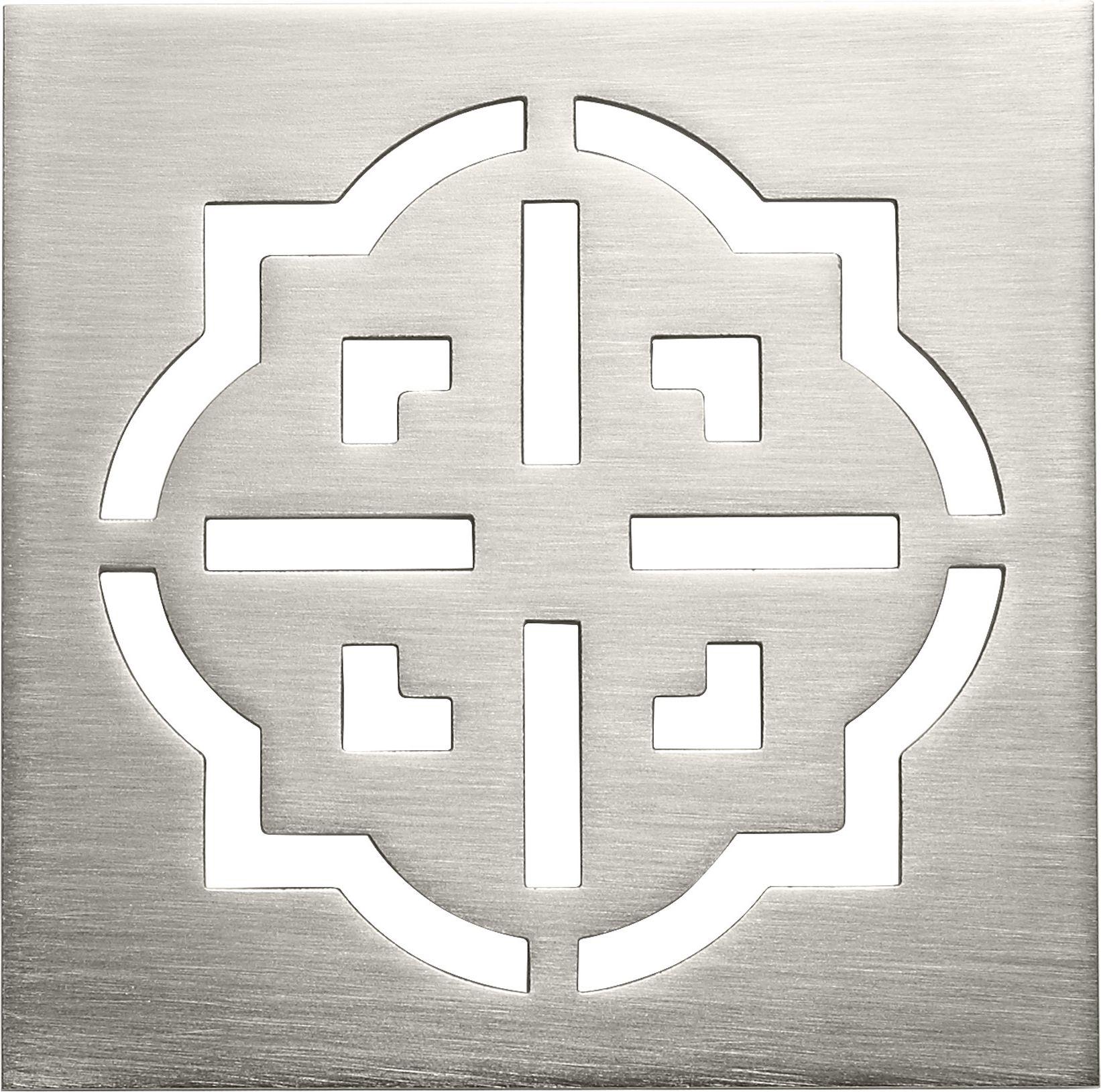 Burnished brass square drain trim grid with geometric cutout pattern and centered vertical slot.