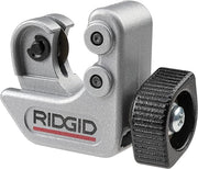 RIDGID close quarters tubing cutter with silver cast body, black cutting wheel, and adjustment knob.