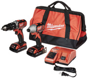 Milwaukee M18 cordless combo kit with drill, impact driver, two batteries, charger, and canvas tool bag.