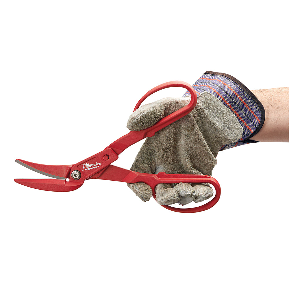 Red offset compound tin snips with curved blades held in a gloved hand.