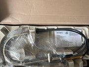 Polished nickel pull-down kitchen faucet with arc spout and black hose, shown unboxed with instruction manual and packaging m