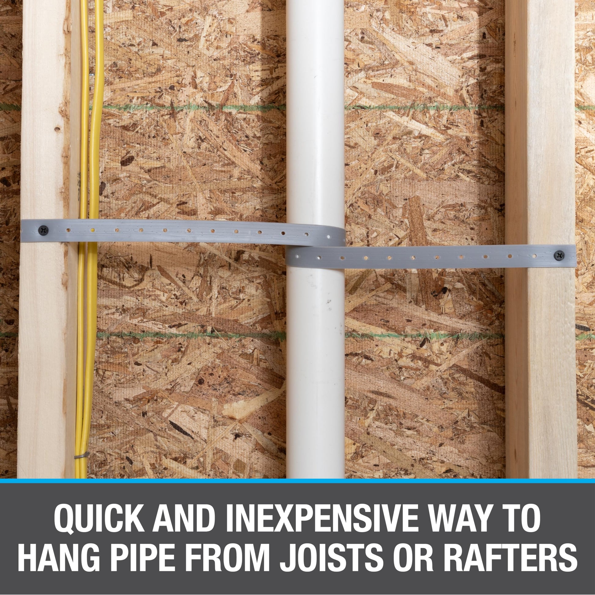 Metal securing strap with perforations securing a white pipe to wooden joists.