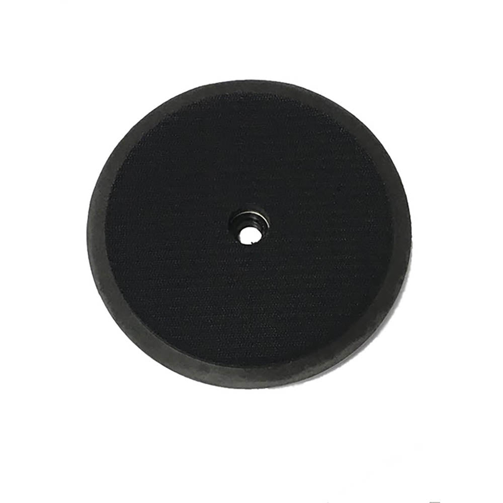 Black circular backing pad with center mounting hole and textured surface.