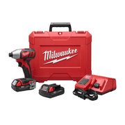 Milwaukee M18 1/4 inch hex impact driver with two batteries, charger, and red carrying case.