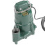 Cast iron submersible pump with green finish, rectangular body, and attached power cord.