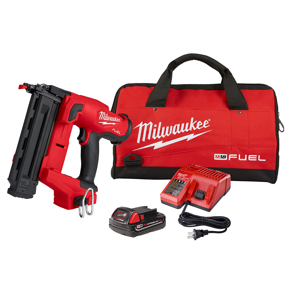 Red and black M18 FUEL brad nailer kit with battery, charger, tool bag, and power cord.