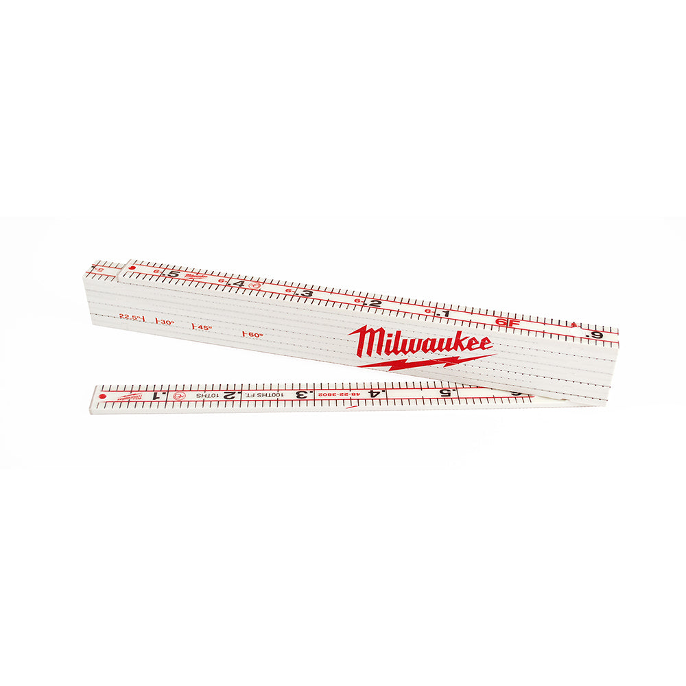 White composite folding rule with red measurement markings and Milwaukee branding, shown partially extended.