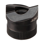 Black metal punch tool with cylindrical ribbed base, curved cutting head, and central circular opening.