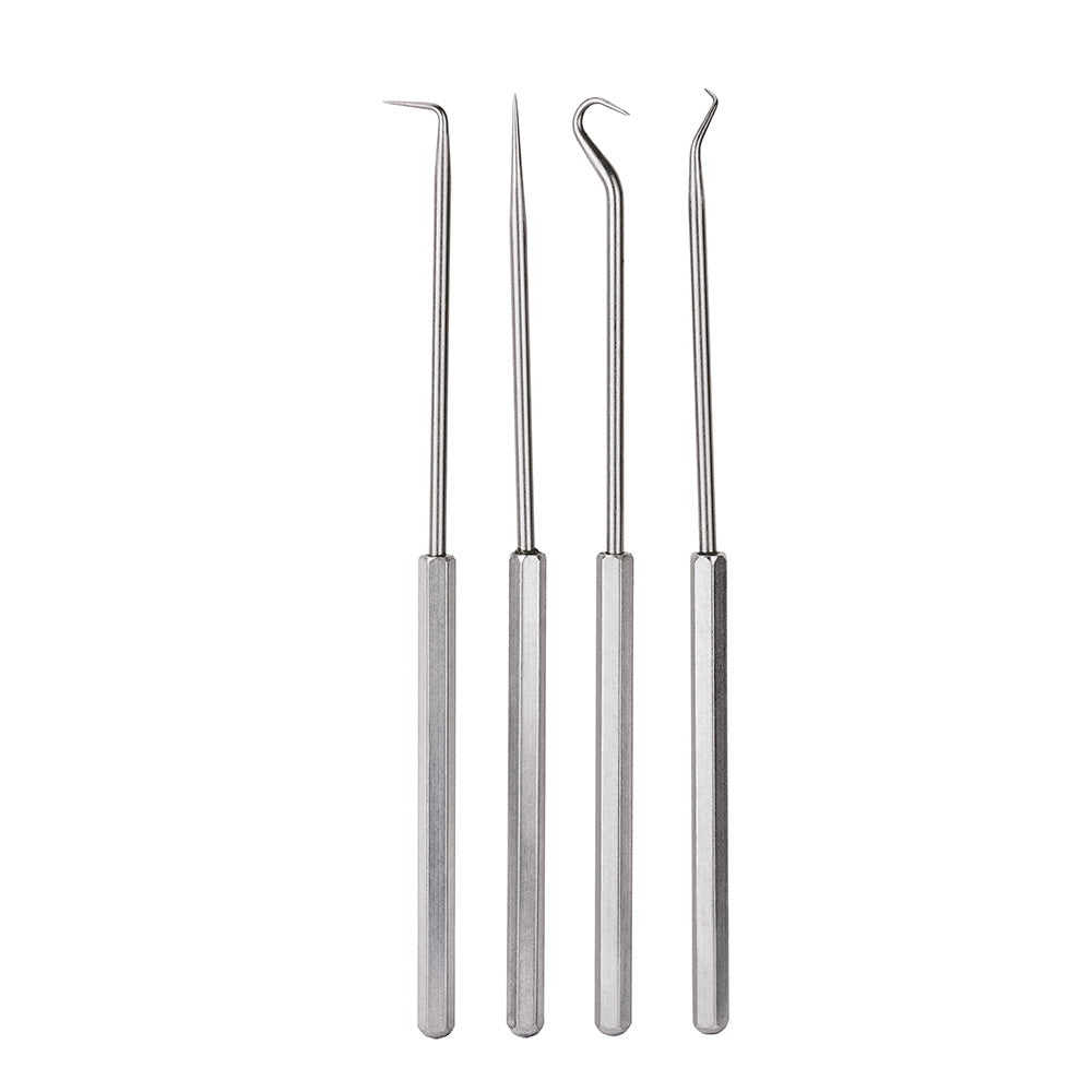 Four metal picks with different curved and pointed tip designs and textured handles.
