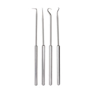 Four metal picks with different curved and pointed tip designs and textured handles.