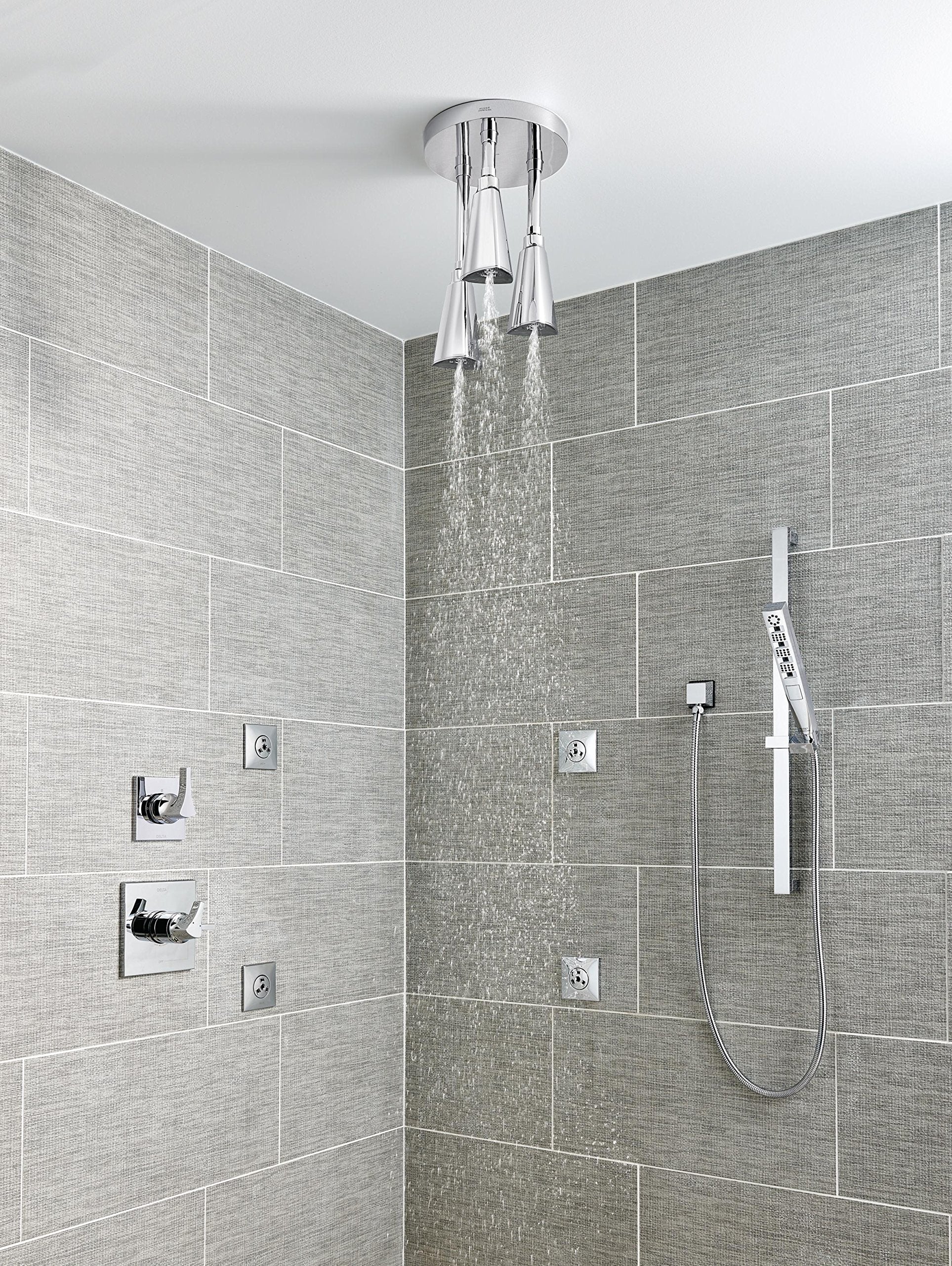 Chrome square wall elbow connector mounted on ceiling with hand shower hose attached, demonstrating installation in shower en
