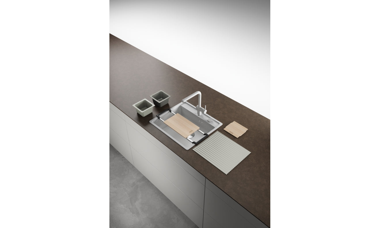 Franke AIUS200 sink accessory system with stainless steel tray, cutting board, and container organizers on countertop.