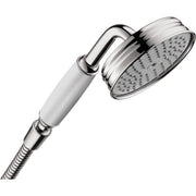Chrome handheld showerhead with round spray face and flexible hose attached.