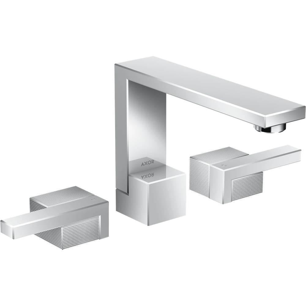 Chrome three-piece widespread faucet with geometric handles and extended spout.